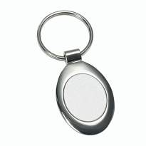 Oval satin and polished metal key ring in a black box