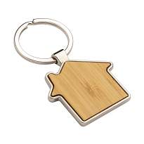 Metal keychain in the shape of a small house, with bamboo front detail