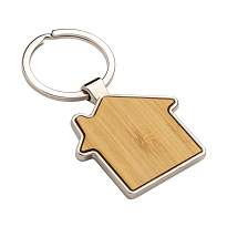 Metal keychain in the shape of a small house, with bamboo front detail