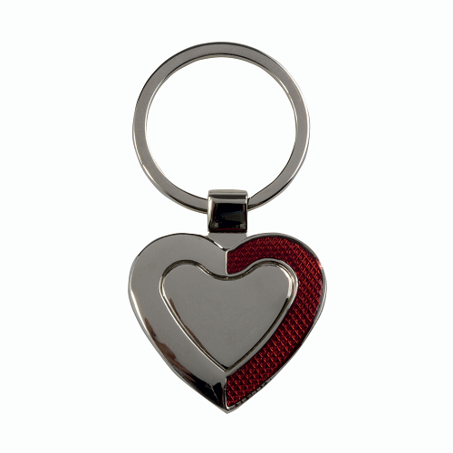Heart-shaped metal key ring with shimmering colour detail on one side in a black box 2